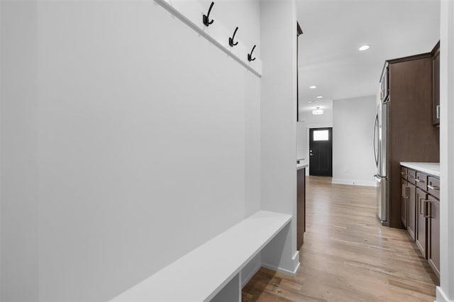 306 NW 3rd St, Monroe, WI 53566 - mudroom featuring light wood-style floors, baseboards, and recessed lighting