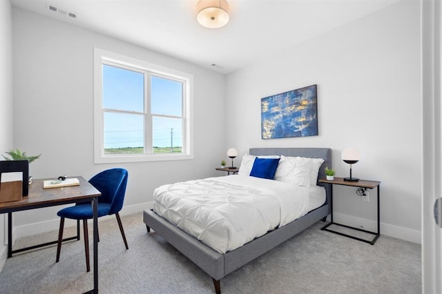 223 NW 3rd Ave, Monroe, WI 53566 - bedroom with visible vents, carpet flooring, and baseboards