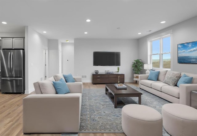 223 NW 3rd Ave, Monroe, WI 53566 - living area featuring visible vents, recessed lighting, and light wood finished floors