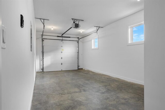 255 NW 3rd Ave, Monroe, WI 53566 - garage featuring a garage door opener