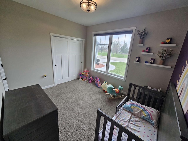 456 N Hyland St, Juneau, WI 53039 - carpeted bedroom with baseboards and a closet