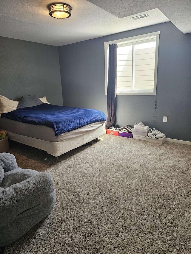 456 N Hyland St, Juneau, WI 53039 - carpeted bedroom with a textured ceiling