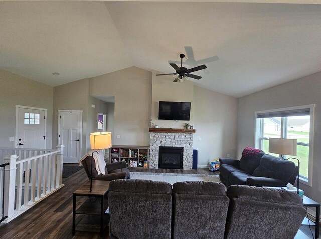 456 N Hyland St, Juneau, WI 53039 - living area with dark wood-type flooring, lofted ceiling, ceiling fan, healthy amount of natural light, and a fireplace