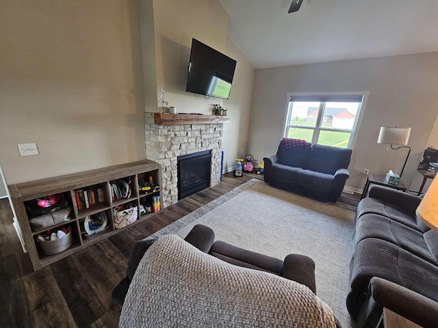 456 N Hyland St, Juneau, WI 53039 - living room featuring vaulted ceiling, wood finished floors, and a fireplace