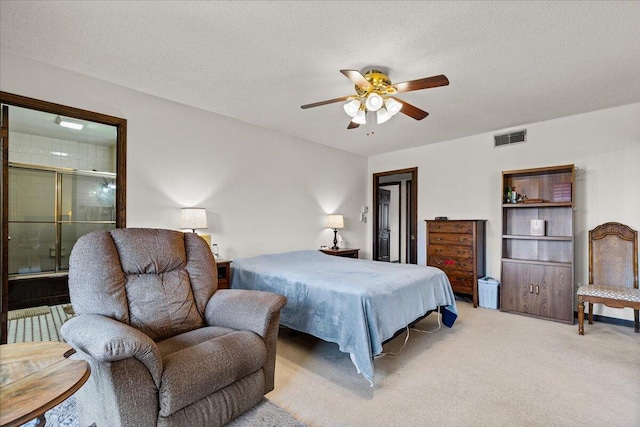 N84W16033 Menomonee Ave Unit 200, Menomonee Falls, WI 53051 - bedroom with light carpet, ceiling fan, and a textured ceiling