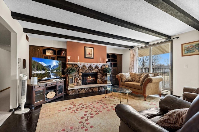 N84W16033 Menomonee Ave Unit 200, Menomonee Falls, WI 53051 - living area featuring a stone fireplace, beamed ceiling, and a textured ceiling