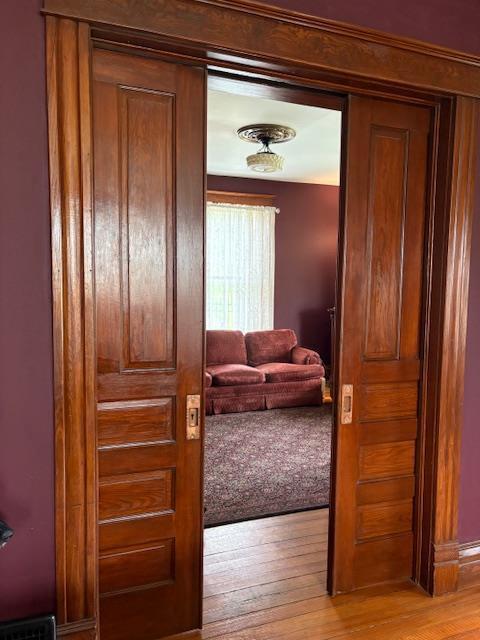 N1453 Clover Rd, Genoa City, WI 53128 - hallway with light wood-type flooring