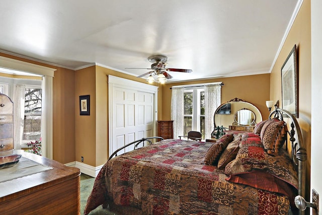 N1453 Clover Rd, Genoa City, WI 53128 - bedroom with baseboards, ornamental molding, ceiling fan, and wood finished floors