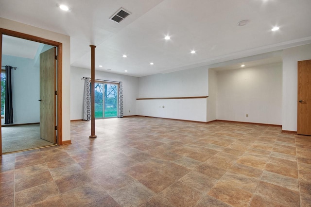 524 Tindalls Nest, Twin Lakes, WI 53181 - unfurnished room with baseboards, stone finish flooring, recessed lighting, and visible vents