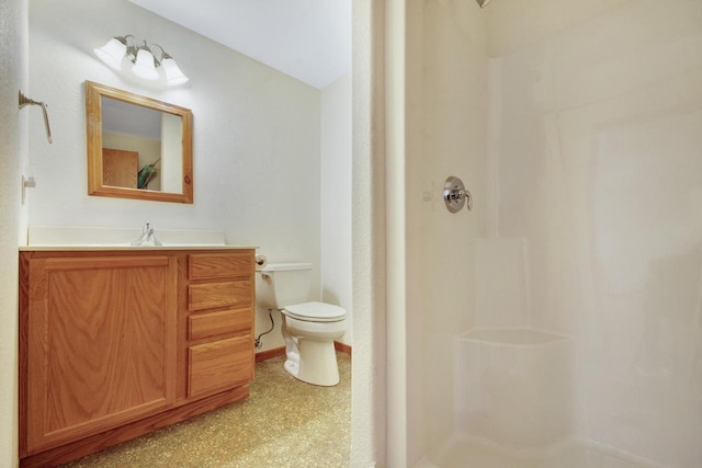 524 Tindalls Nest, Twin Lakes, WI 53181 - bathroom featuring vanity, a shower, and toilet
