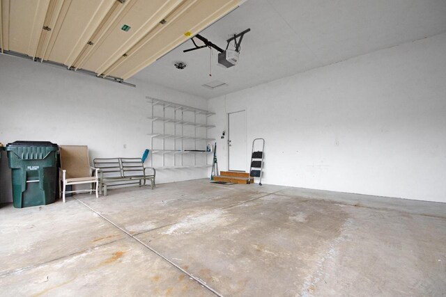 524 Tindalls Nest, Twin Lakes, WI 53181 - garage with a garage door opener