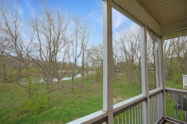 524 Tindalls Nest, Twin Lakes, WI 53181 - unfurnished sunroom with a water view