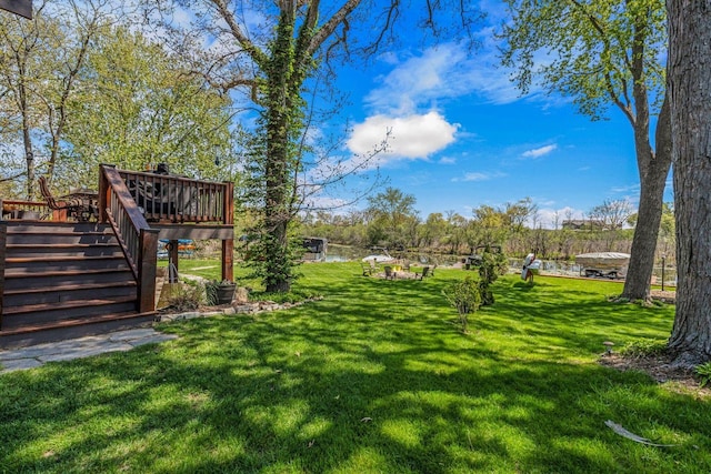 3024 Nagawicka Ave, Delafield, WI 53018 - view of grassy yard featuring stairway and a wooden deck