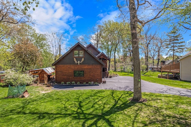 3024 Nagawicka Ave, Delafield, WI 53018 - view of home's exterior with a lawn