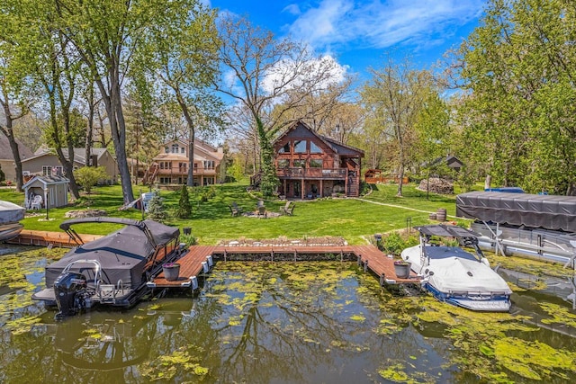3024 Nagawicka Ave, Delafield, WI 53018 - dock with a lawn, a water view, and boat lift