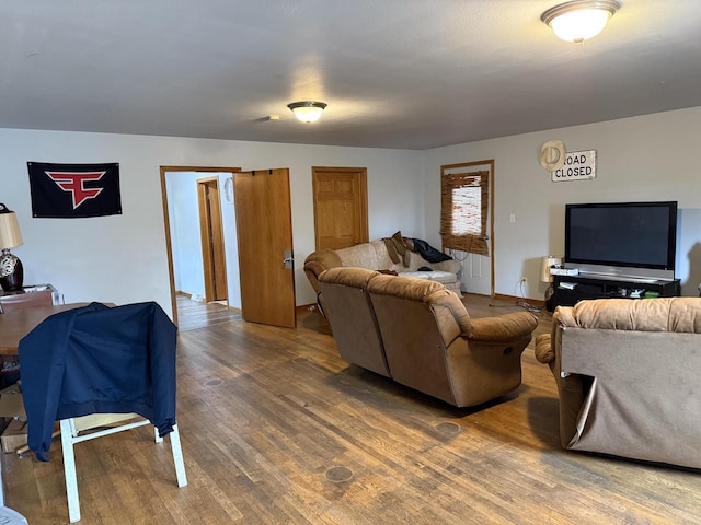 living area with wood finished floors