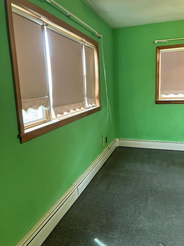 365 Jenkynsville Rd, Benton, WI 53803 - spare room featuring baseboards and baseboard heating