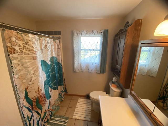 full bathroom with tile patterned floors, vanity, toilet, and curtained shower