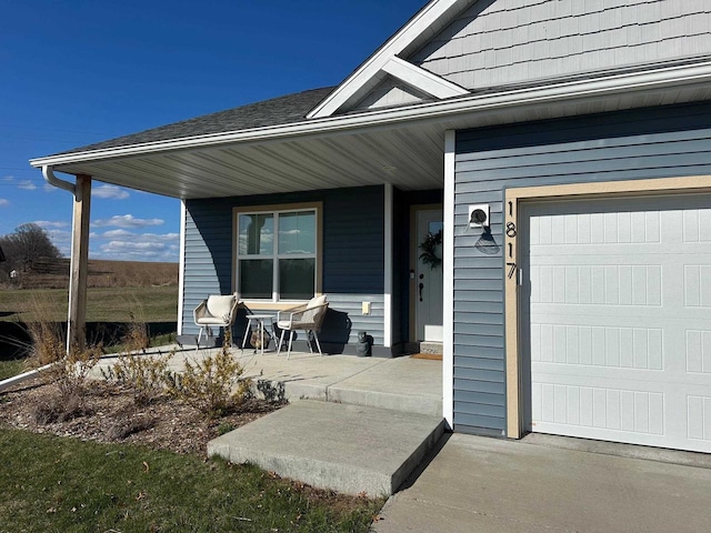 1817 Ridgewood Cir, Menomonie, WI 54751 - entrance to property with a porch and a garage