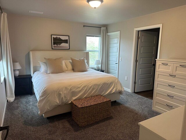 1817 Ridgewood Cir, Menomonie, WI 54751 - bedroom featuring dark colored carpet