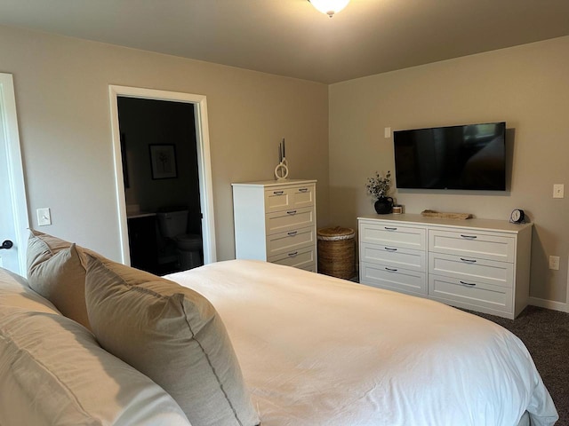 1817 Ridgewood Cir, Menomonie, WI 54751 - bedroom featuring dark colored carpet, ensuite bath, and baseboards