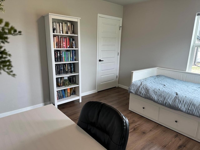 1817 Ridgewood Cir, Menomonie, WI 54751 - bedroom featuring wood finished floors and baseboards