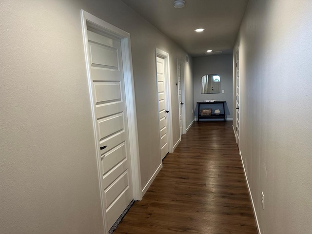 1817 Ridgewood Cir, Menomonie, WI 54751 - corridor with dark wood-style floors, baseboards, and recessed lighting
