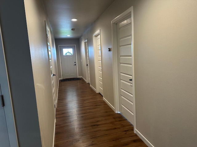 1817 Ridgewood Cir, Menomonie, WI 54751 - doorway to outside with dark wood-type flooring and baseboards