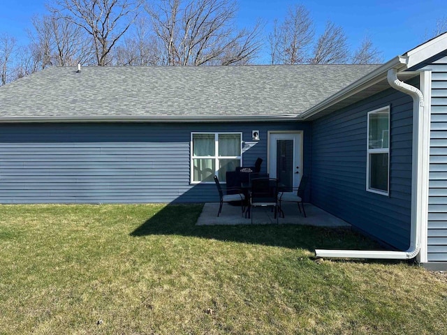 1817 Ridgewood Cir, Menomonie, WI 54751 - back of house with a patio area and a lawn