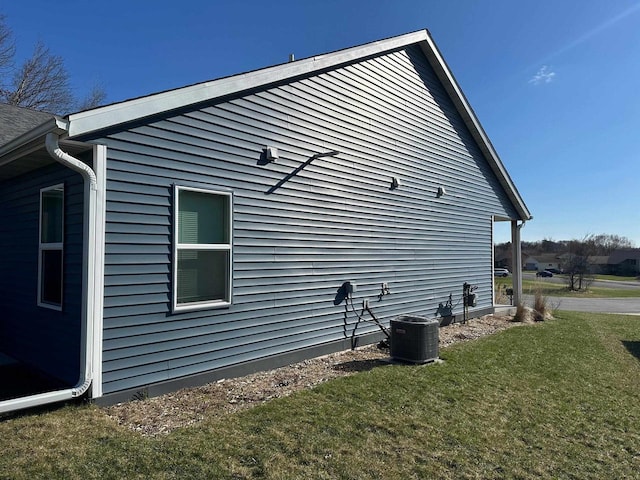 1817 Ridgewood Cir, Menomonie, WI 54751 - view of property exterior featuring cooling unit and a lawn