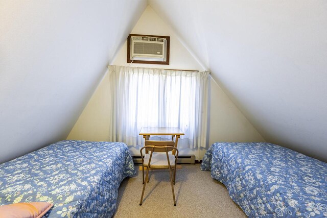 101224 25th St, Chetek, WI 54728 - carpeted bedroom with a baseboard radiator, lofted ceiling, and a wall mounted air conditioner