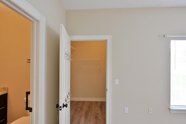 hall featuring wood finished floors