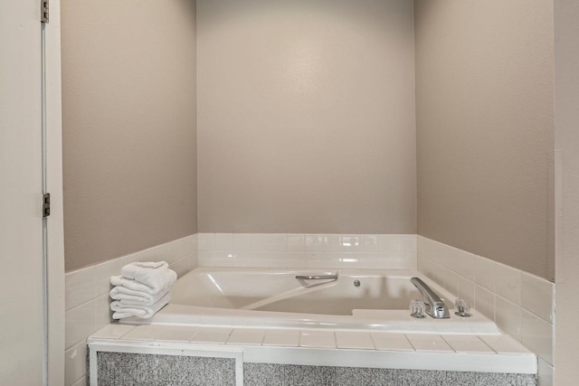 full bathroom featuring a garden tub