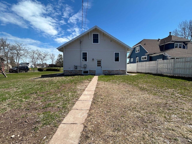 1019 Ellis Ave, Ashland, WI 54806 - rear view of property with fence and a yard