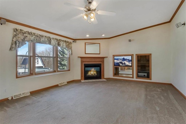 unfurnished living room featuring visible vents, carpet, and baseboards