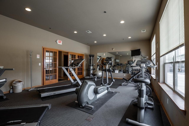 workout area featuring recessed lighting and visible vents