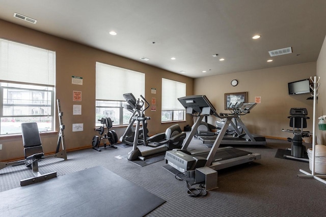gym with recessed lighting, carpet flooring, baseboards, and visible vents