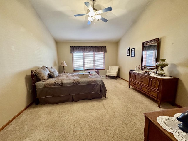 3027 S Bartells Dr, Beloit, WI 53511 - bedroom featuring baseboards, a ceiling fan, vaulted ceiling, and light carpet