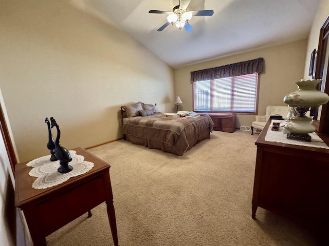 3027 S Bartells Dr, Beloit, WI 53511 - bedroom with light colored carpet, vaulted ceiling, baseboards, and a ceiling fan