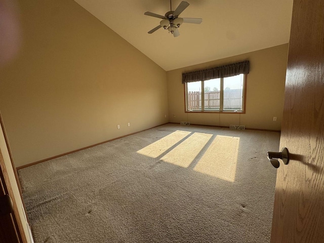 3027 S Bartells Dr, Beloit, WI 53511 - carpeted spare room featuring lofted ceiling, ceiling fan, and baseboards
