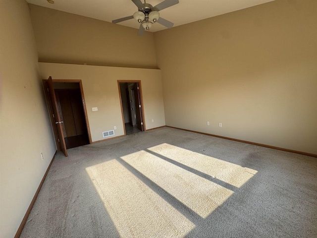 3027 S Bartells Dr, Beloit, WI 53511 - unfurnished bedroom with light carpet, baseboards, and a ceiling fan
