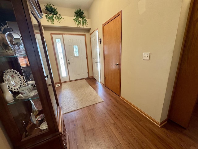 3027 S Bartells Dr, Beloit, WI 53511 - entryway with light wood-style floors and baseboards