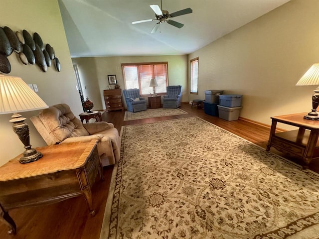 3027 S Bartells Dr, Beloit, WI 53511 - living room with a ceiling fan, baseboards, wood finished floors, and lofted ceiling