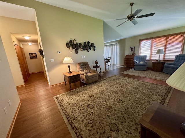 3027 S Bartells Dr, Beloit, WI 53511 - living area featuring baseboards, ceiling fan, and wood finished floors