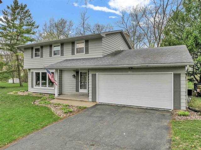 6643 Forest Park Dr, Deforest, WI 53532 - traditional-style home featuring an attached garage, a front lawn, and driveway