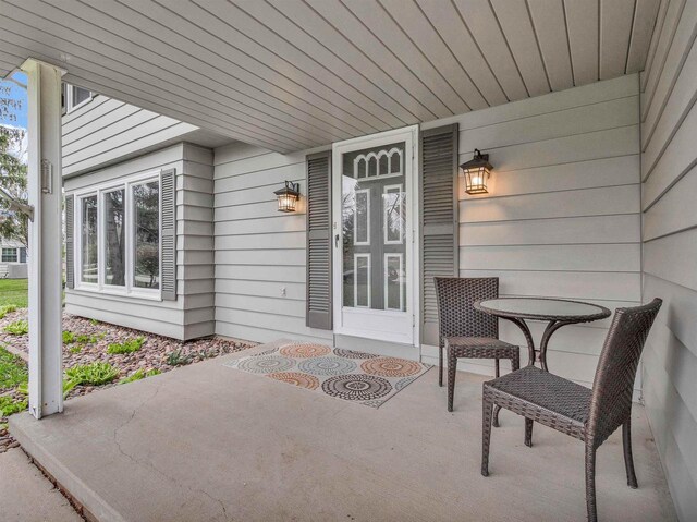 6643 Forest Park Dr, Deforest, WI 53532 - view of exterior entry with a patio