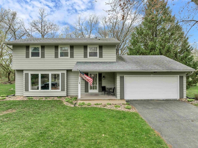 6643 Forest Park Dr, Deforest, WI 53532 - traditional-style home with an attached garage, driveway, and a front yard