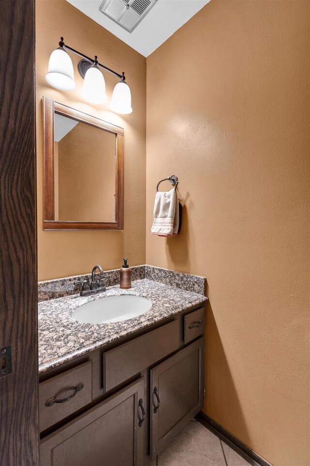 6643 Forest Park Dr, Deforest, WI 53532 - bathroom with tile patterned floors, visible vents, and vanity