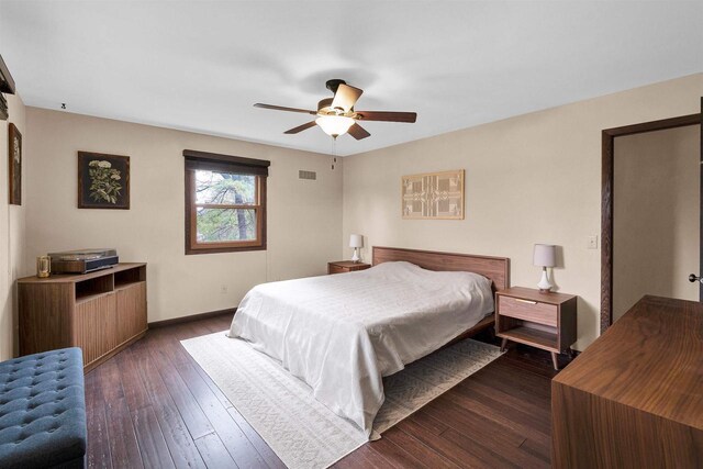 6643 Forest Park Dr, Deforest, WI 53532 - bedroom with a ceiling fan, baseboards, visible vents, and dark wood-type flooring