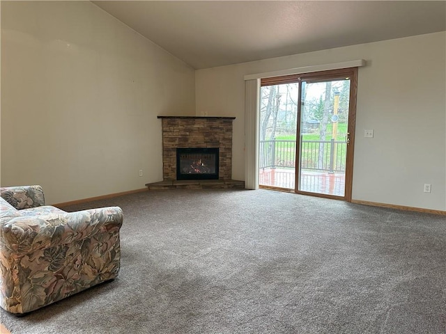living area with carpet floors, baseboards, a fireplace, and lofted ceiling